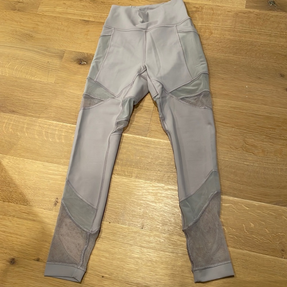 Lululemon leggings size 4 with sheer and mesh, grayish tan